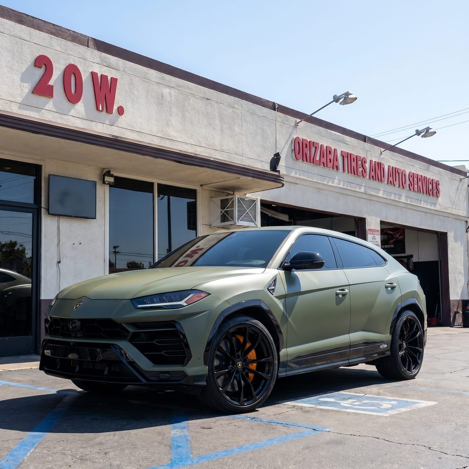 Orizaba Tires and Auto storefront on W First St, Santa Ana — central hub